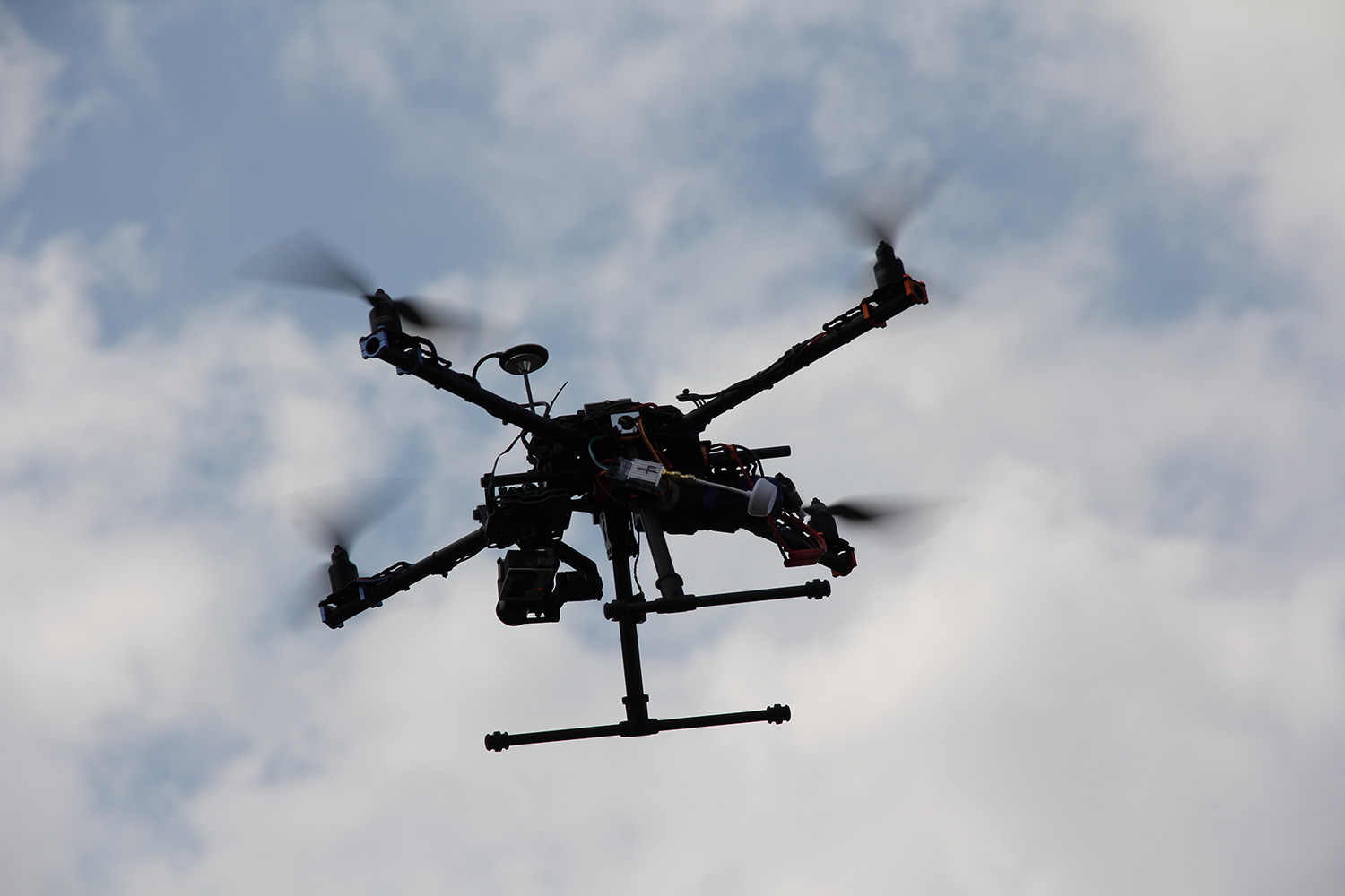 Commercial drone pilot operating on location during an aerial shoot