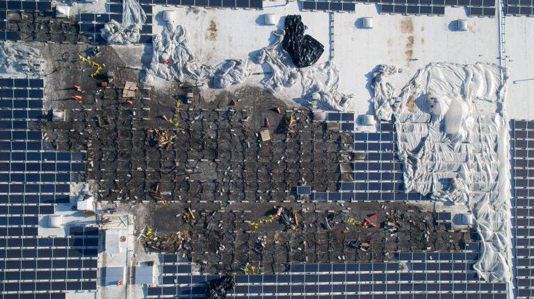High-resolution drone detail of damaged photovoltaic modules