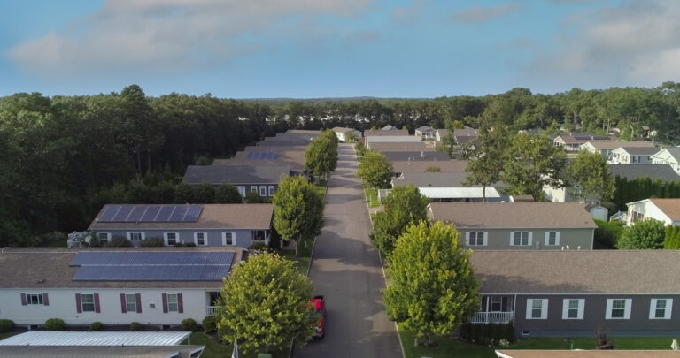 Drone photo overlooking rows of homes in a mobile home park