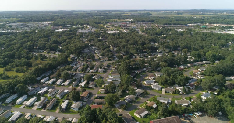 Overhead drone perspective of a mobile home community and access roads