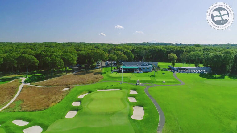 Aerial over St. George’s Golf & Country Club with the clubhouse beyond the green, East Setauket, NY