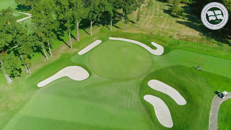 Bunker-ringed elevated green at St. George’s Golf & Country Club, seen by drone