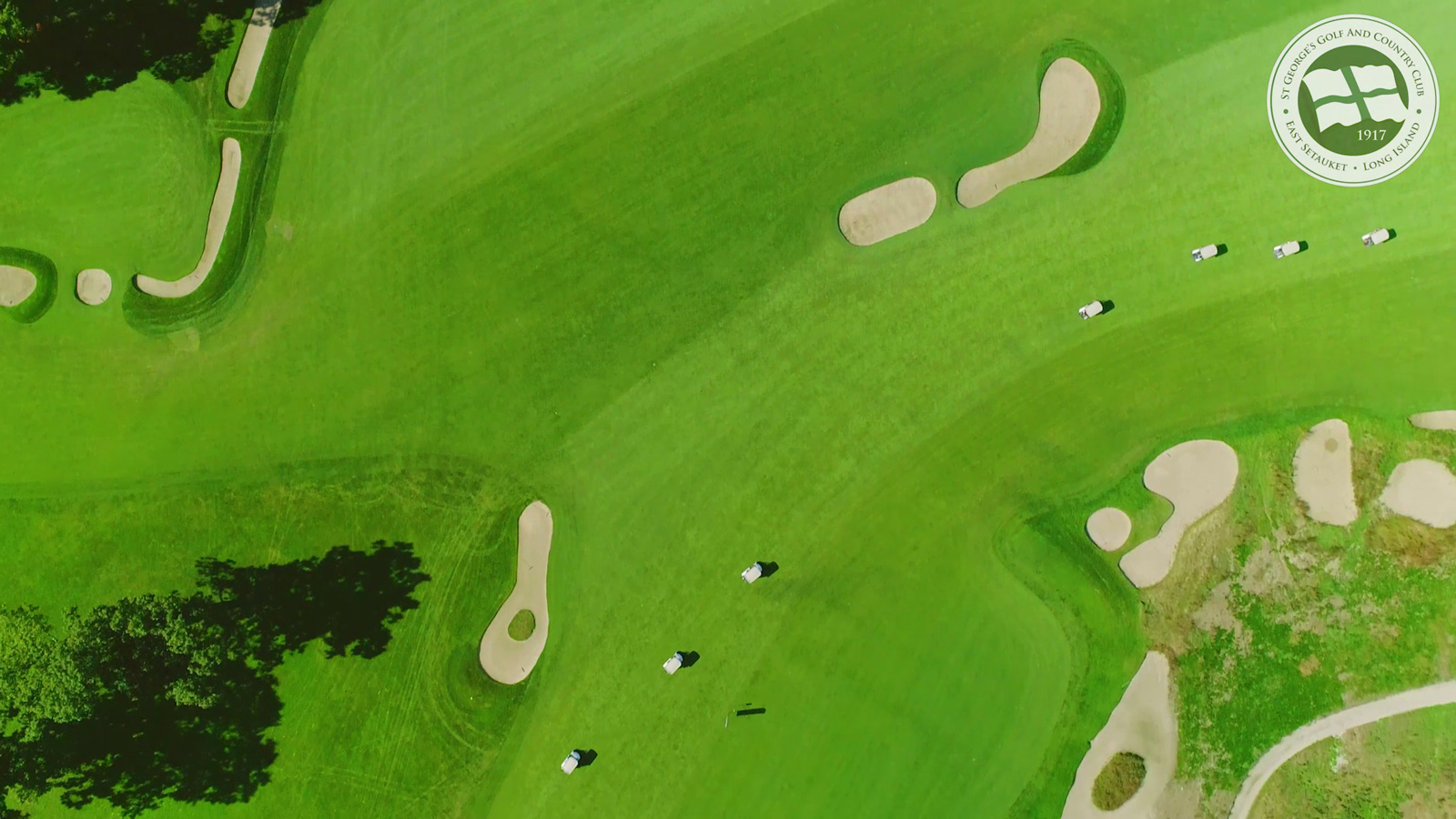 Top-down drone view of a fairway and green at St. George’s Golf & Country Club, East Setauket, NY