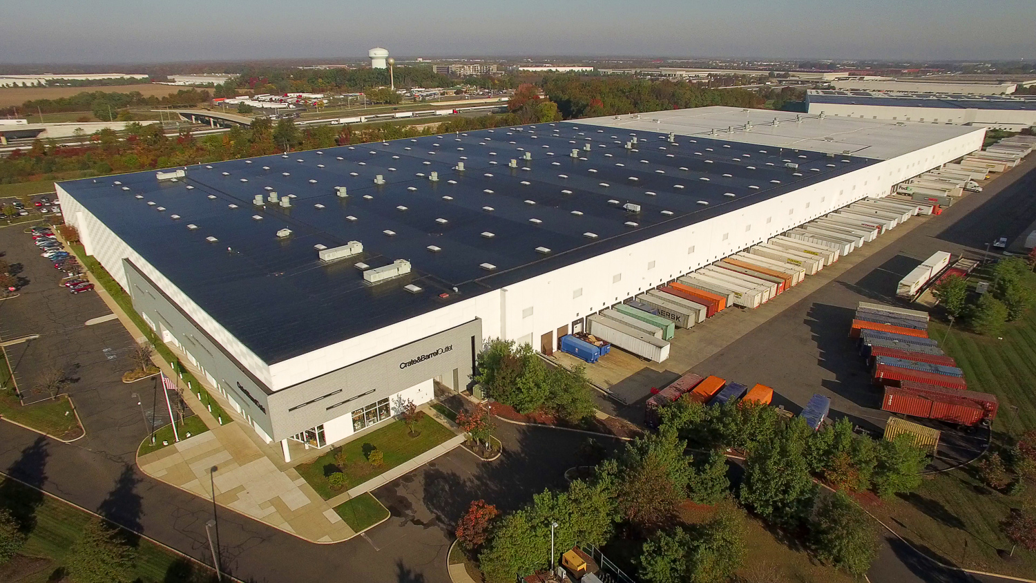 Drone photo of a warehouse facility and truck access in New Jersey