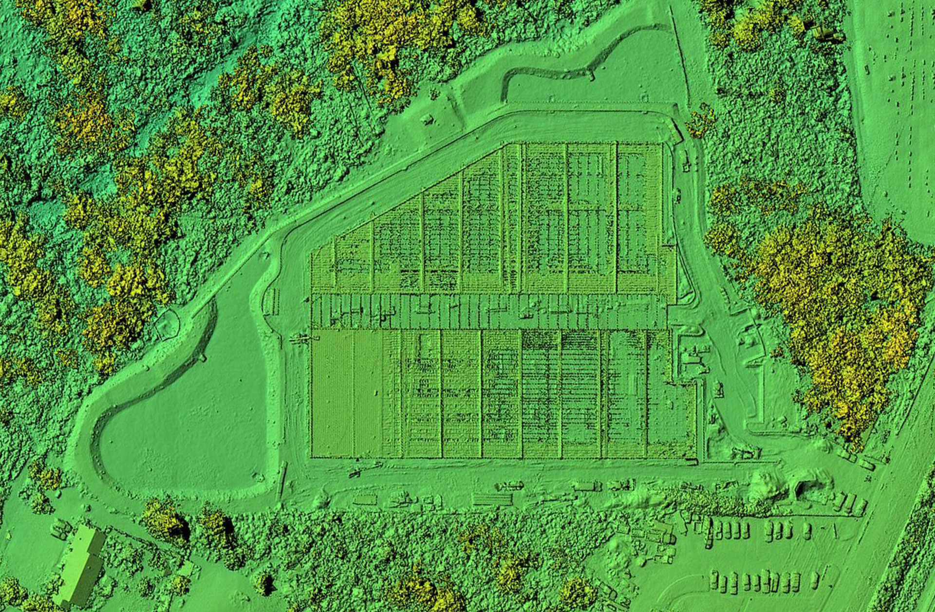 Color-coded drone elevation model of a Belle Mead NJ construction site showing terrain and structure heights