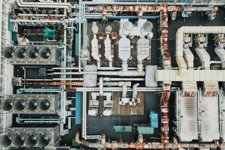 Straight-down aerial view of an industrial plant and rooftop equipment