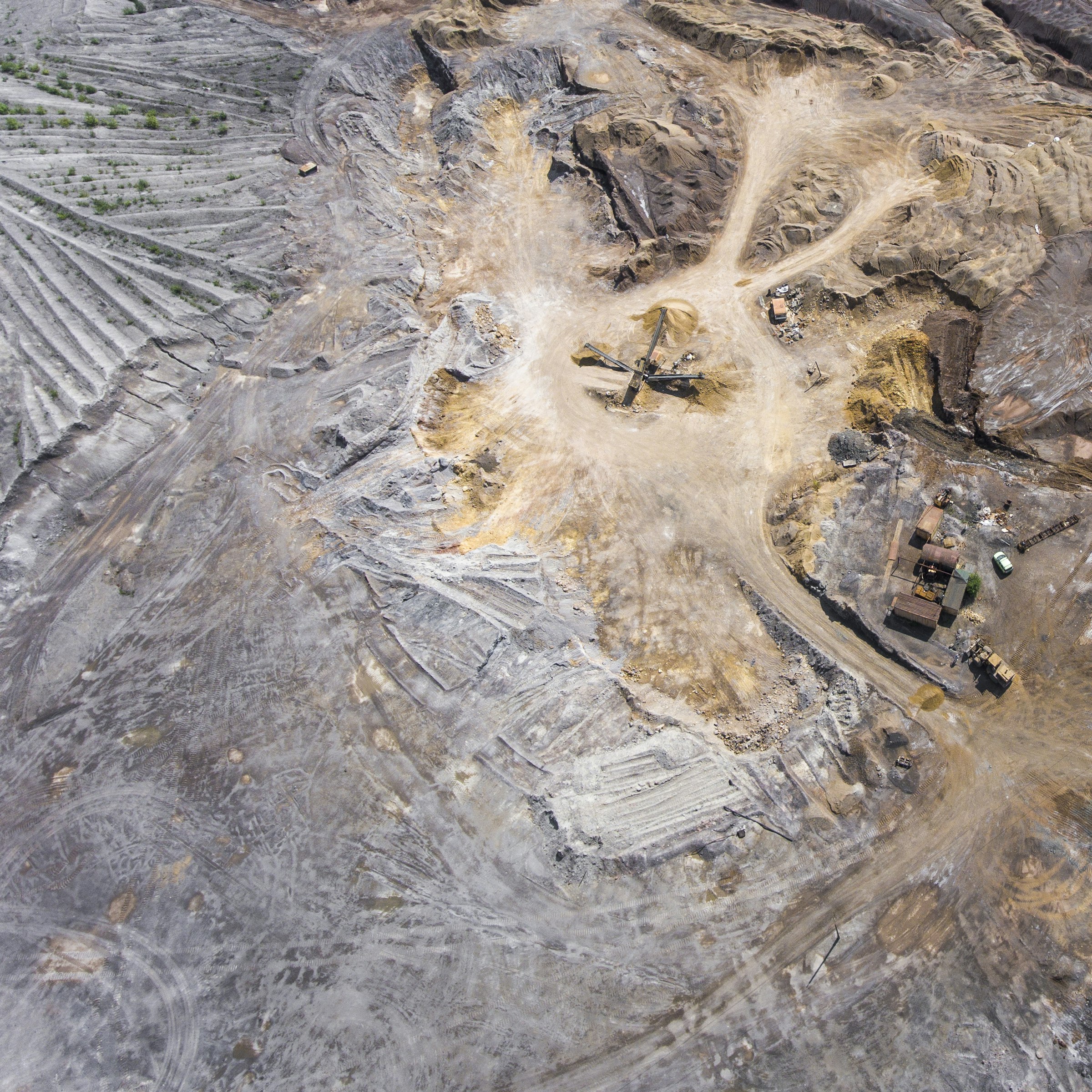 Overhead aerial view of a mining and excavation site