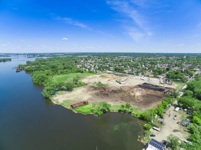 Drone view of the Camden, NJ riverfront and recycling yard from over the water