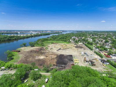 Aerial of the Camden, NJ recycling yard with the river beyond