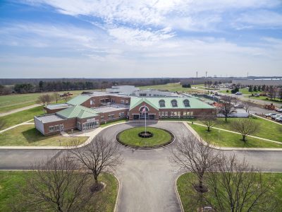 Drone view of a campus entrance circle and landscaped grounds in Westampton, NJ
